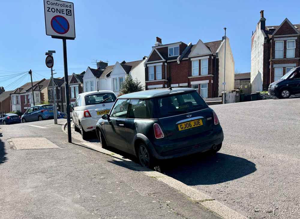 Photograph of GJ06 JUE - a Green Mini Cooper parked in Hollingdean by a non-resident. The twenty-second of twenty-four photographs supplied by the residents of Hollingdean.
