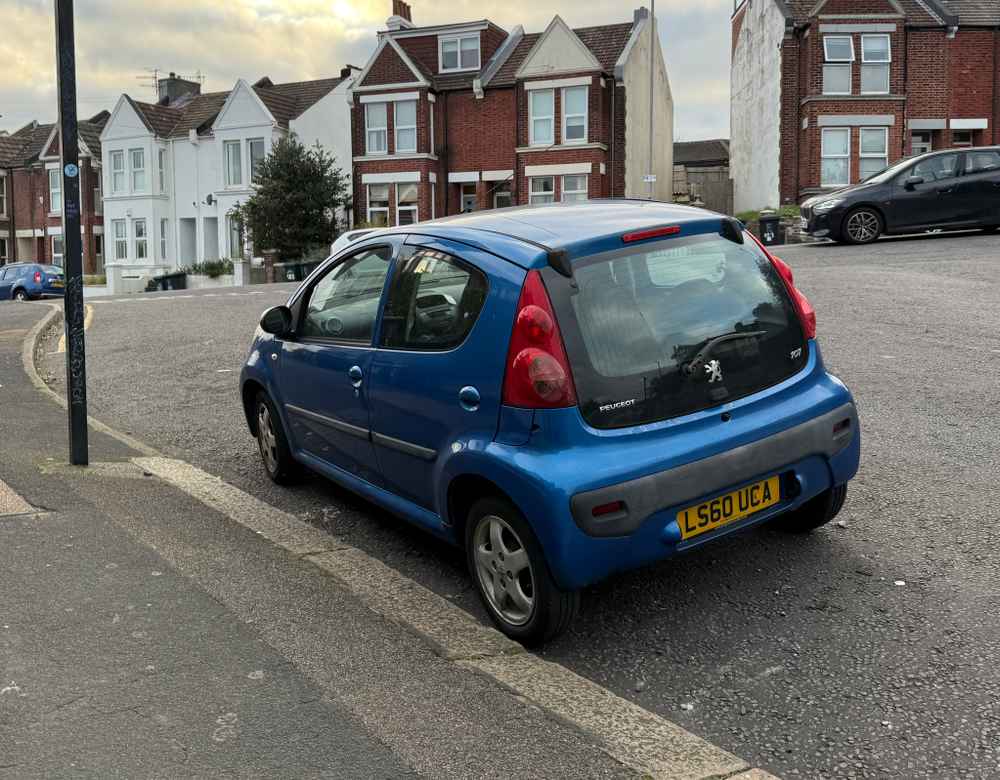 Photograph of LS60 UCA - a Blue Peugeot 107 parked in Hollingdean by a non-resident. The fifteenth of fifteen photographs supplied by the residents of Hollingdean.