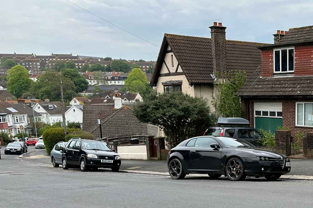 Photograph of SL09 WUB - a Black Alfa Romeo Brera parked in Hollingdean by a non-resident. The twentieth of twenty-six photographs supplied by the residents of Hollingdean.