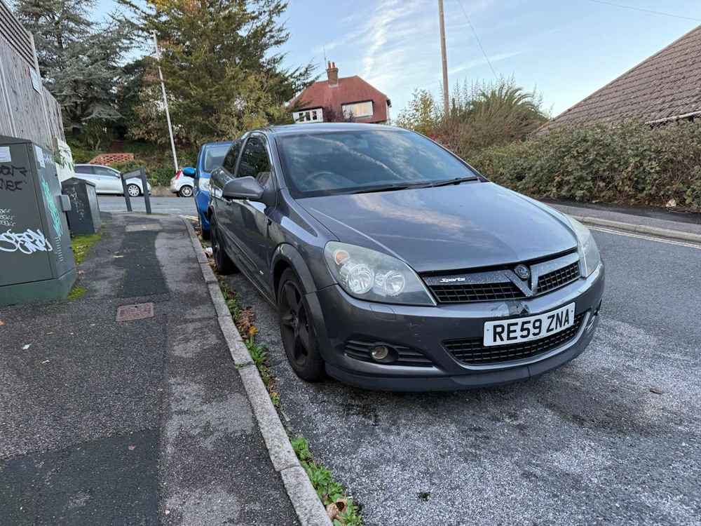 Photograph of RE59 ZNA - a Grey Vauxhall Astra parked in Hollingdean by a non-resident. The twenty-first of twenty-four photographs supplied by the residents of Hollingdean.