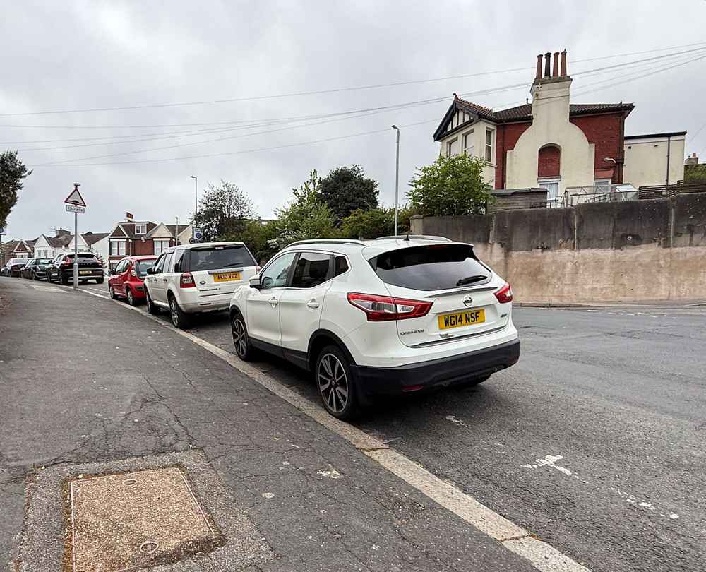 Photograph of WG14 NSF - a White Nissan Qashqai parked in Hollingdean by a non-resident who uses the local area as part of their Brighton commute. The seventh of twelve photographs supplied by the residents of Hollingdean.