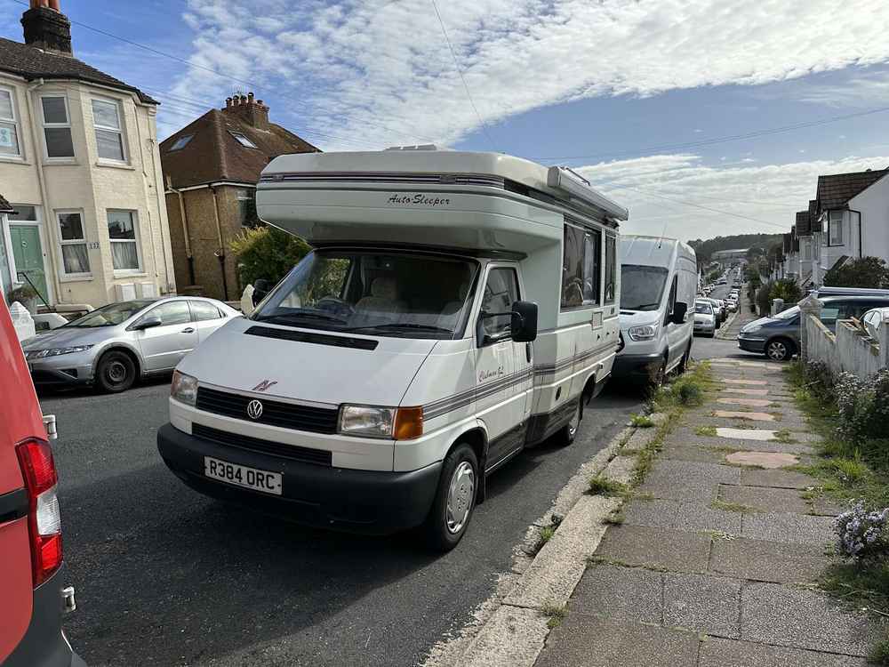 Photograph of R384 ORC - a Beige Volkswagen Transporter camper van parked in Hollingdean by a non-resident, and potentially abandoned. The fifth of fifteen photographs supplied by the residents of Hollingdean.