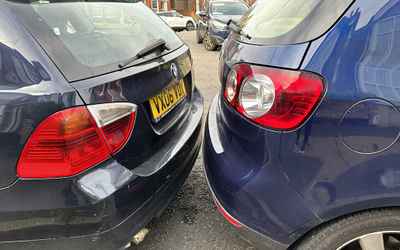 VX06 VOY, a Blue BMW 3 Series parked in Hollingdean