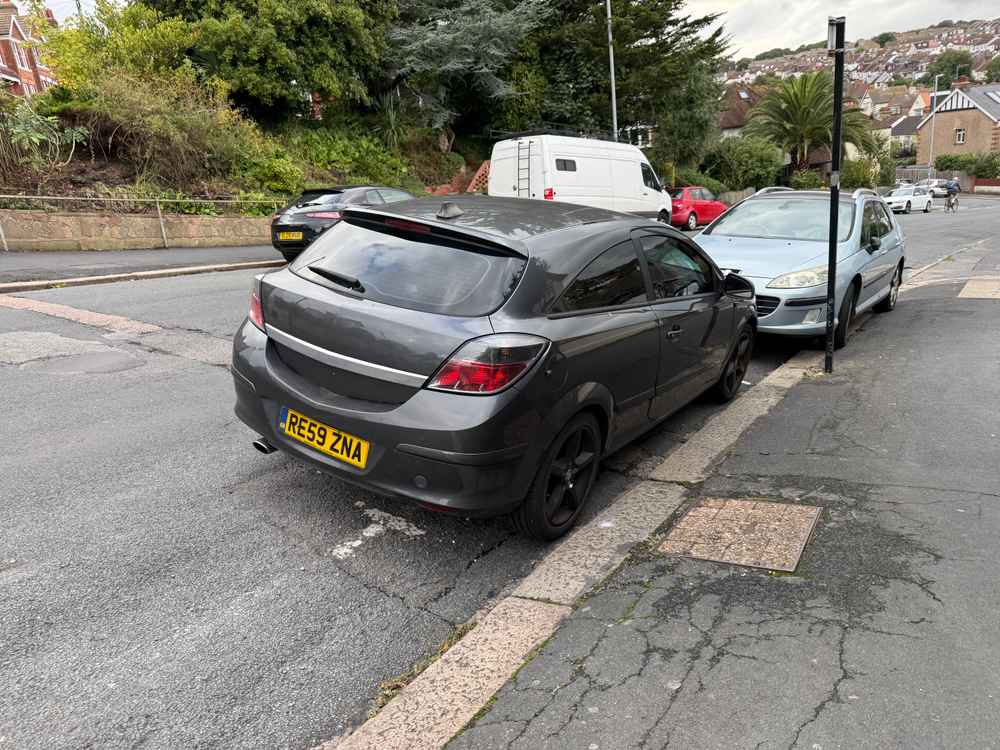 Photograph of RE59 ZNA - a Grey Vauxhall Astra parked in Hollingdean by a non-resident. The eleventh of eleven photographs supplied by the residents of Hollingdean.