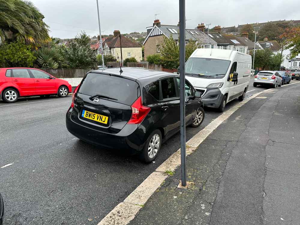 Photograph of BW15 VNJ - a Black Nissan Note parked in Hollingdean by a non-resident who uses the local area as part of their Brighton commute. The tenth of twenty photographs supplied by the residents of Hollingdean.