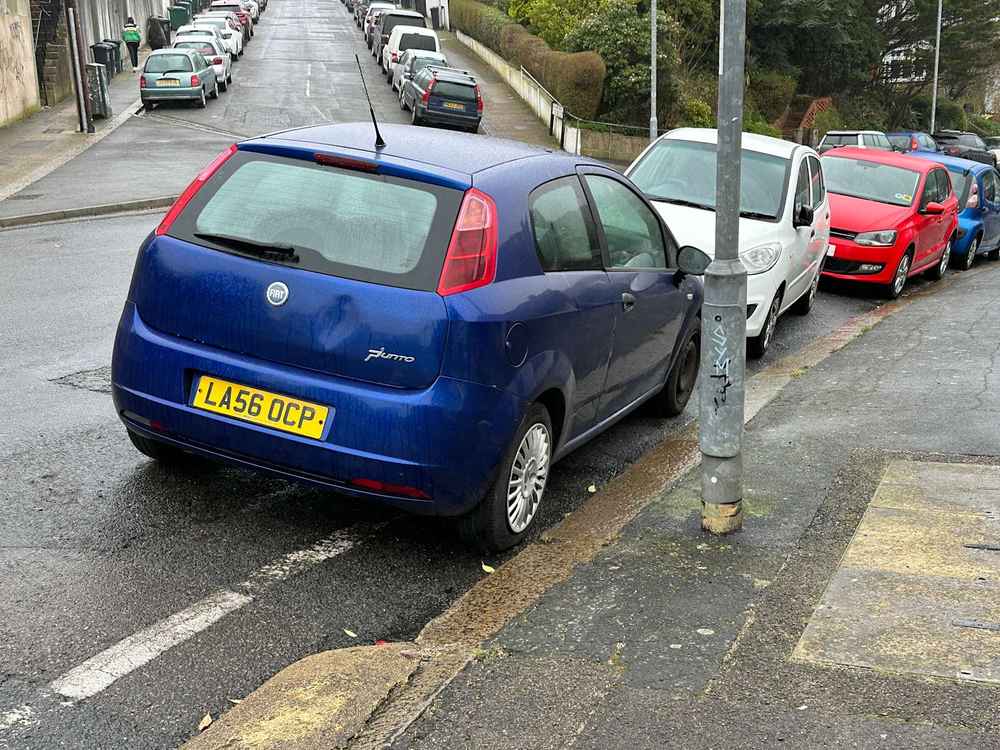 Photograph of LA56 OCP - a Blue Fiat Punto parked in Hollingdean by a non-resident, and potentially abandoned. The second of six photographs supplied by the residents of Hollingdean.