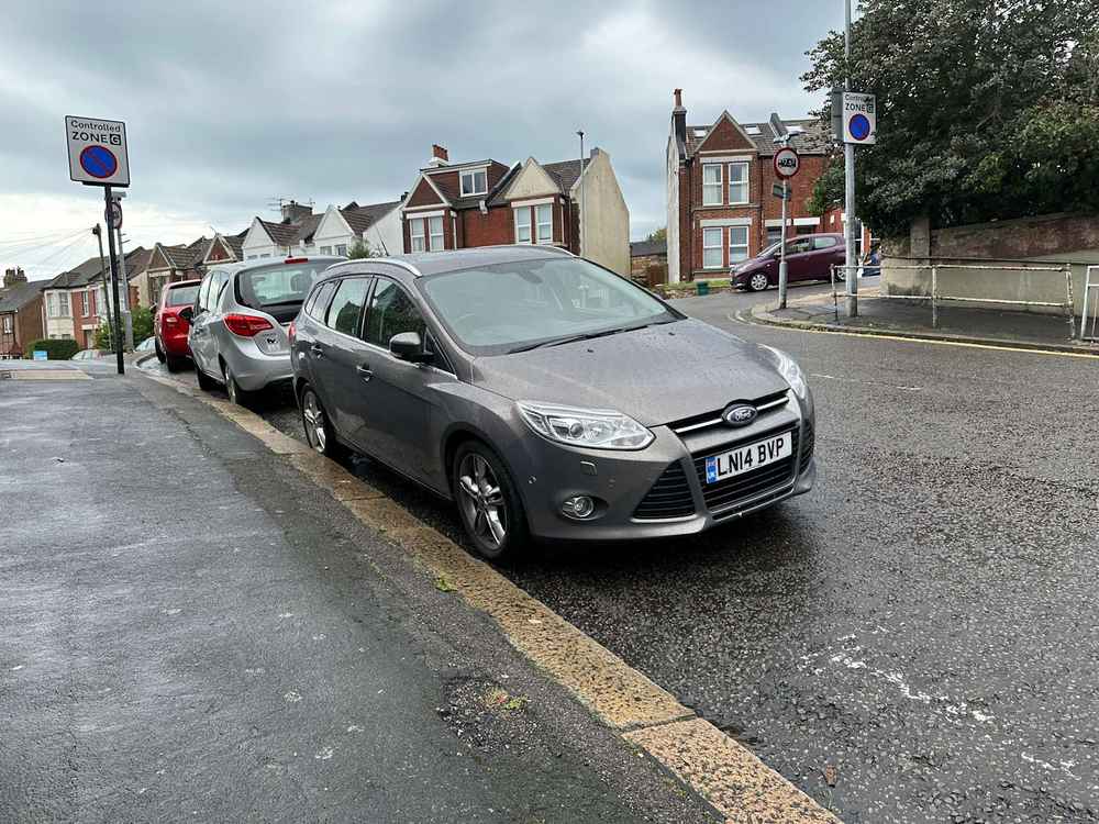 Photograph of LN14 BVP - a Brown Ford Focus parked in Hollingdean by a non-resident. 