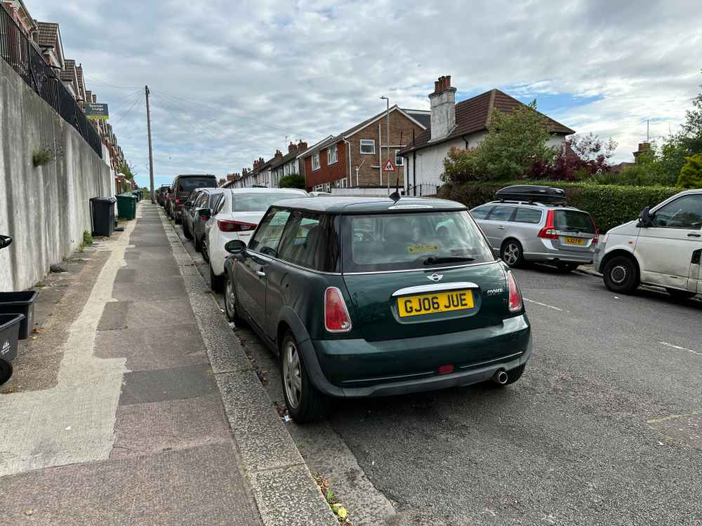 Photograph of GJ06 JUE - a Green Mini Cooper parked in Hollingdean by a non-resident. The thirteenth of fourteen photographs supplied by the residents of Hollingdean.