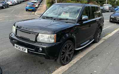 MK06 BOF, a Black Land Rover Ranger Rover parked in Hollingdean