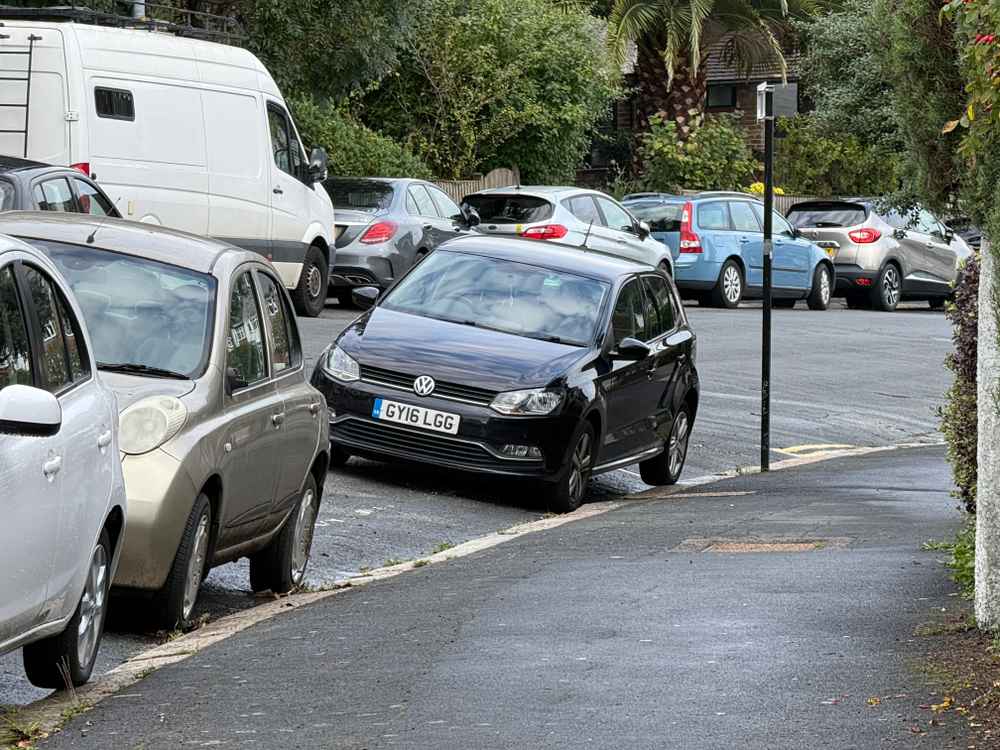 Photograph of GY16 LGG - a Black Volkswagen Polo parked in Hollingdean by a non-resident. The eleventh of eleven photographs supplied by the residents of Hollingdean.