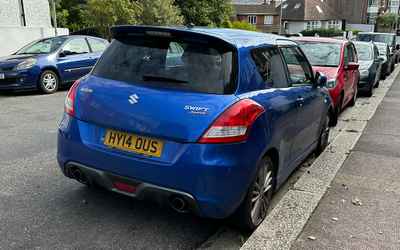 HY14 OUS, a Blue Suzuki Swift parked in Hollingdean