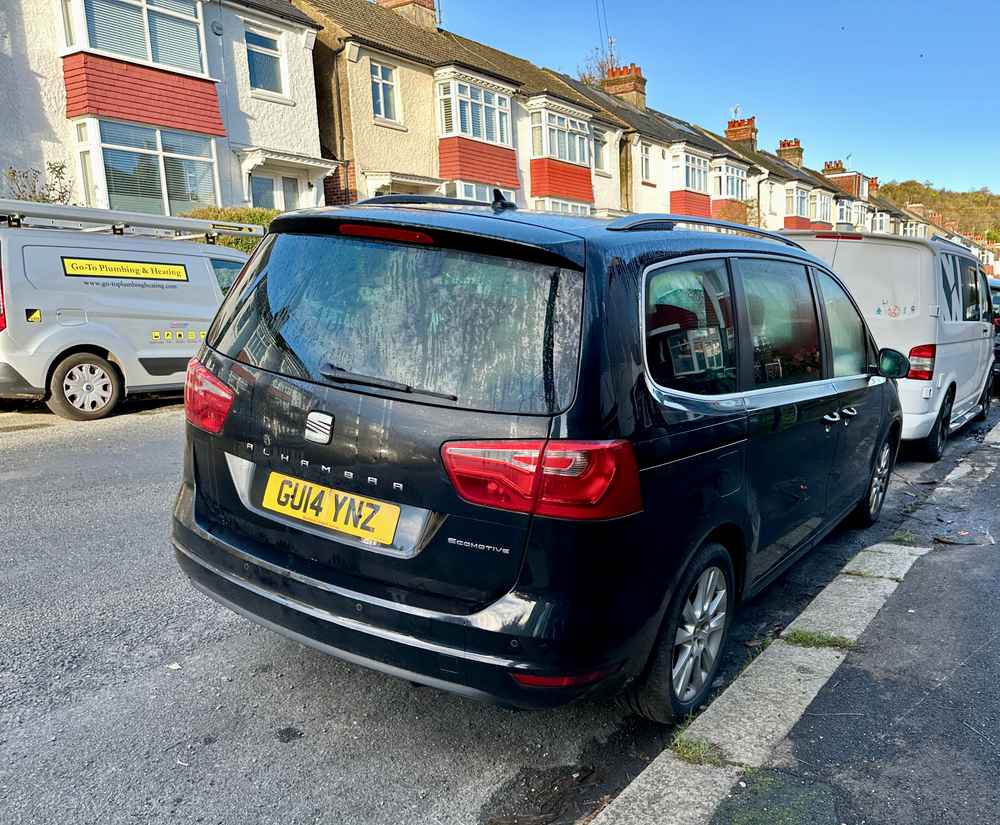 Photograph of GU14 YNZ - a black Seat Alhambra parked in Hollingdean by a non-resident. The first of two photographs supplied by the residents of Hollingdean.