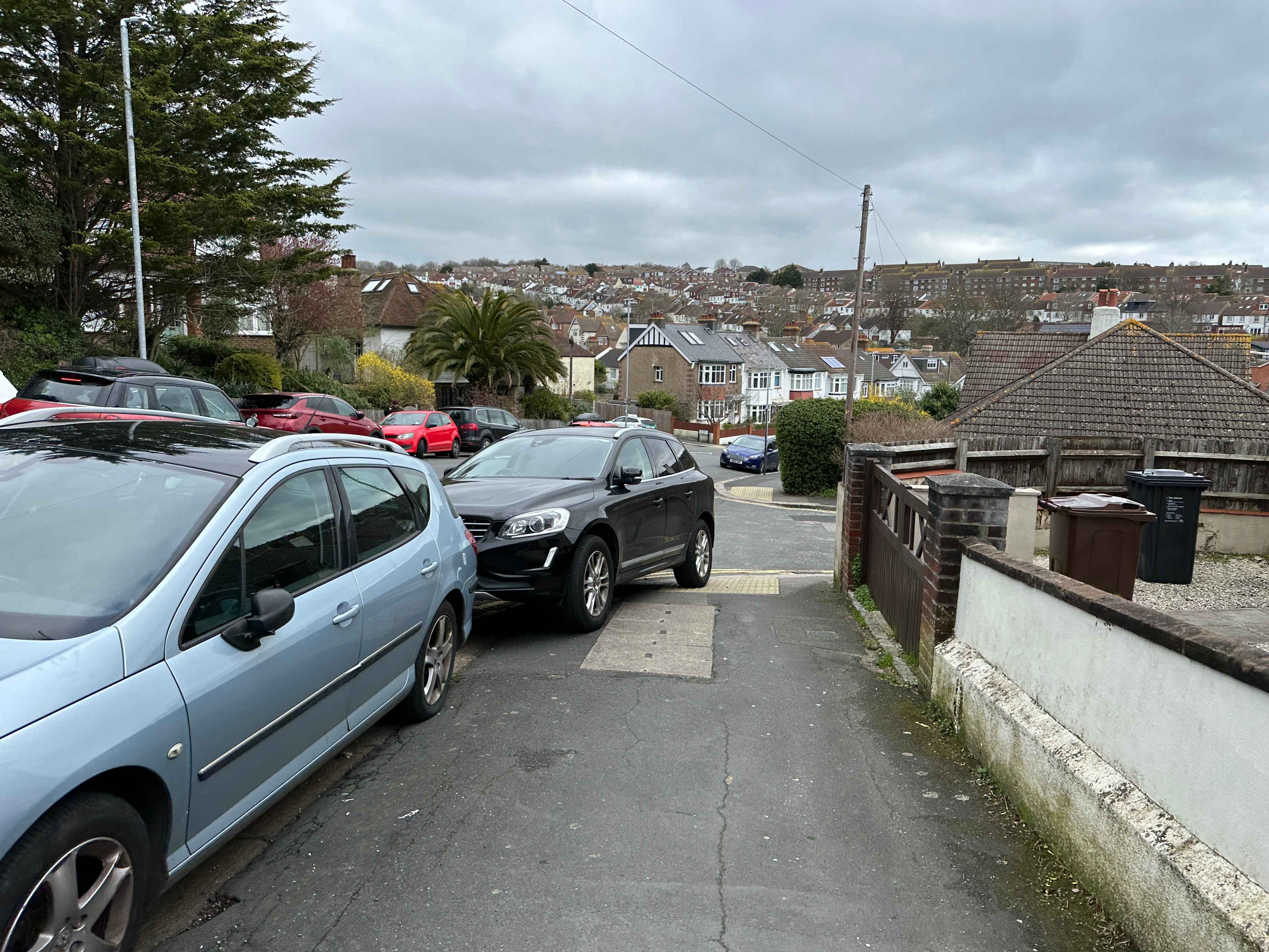 Photograph of DF65 ZZV - a Black Volvo XC60 parked in Hollingdean by a non-resident. The third of eight photographs supplied by the residents of Hollingdean.