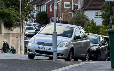 WG54 OSM, a Silver Toyota Yaris parked in Hollingdean