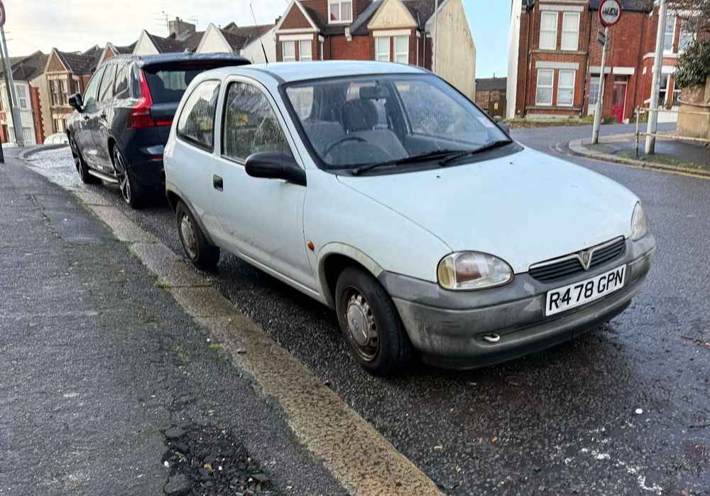 Photograph of R478 GPN - a White Vauxhall Corsa parked in Hollingdean by a non-resident, and potentially abandoned. The fifth of five photographs supplied by the residents of Hollingdean.