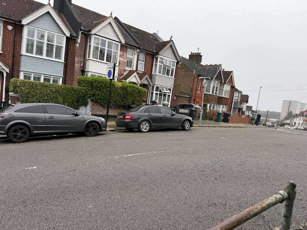 Photograph of LM63 KMK - a Black Mercedes C Class parked in Hollingdean by a non-resident who uses the local area as part of their Brighton commute. The first of eleven photographs supplied by the residents of Hollingdean.