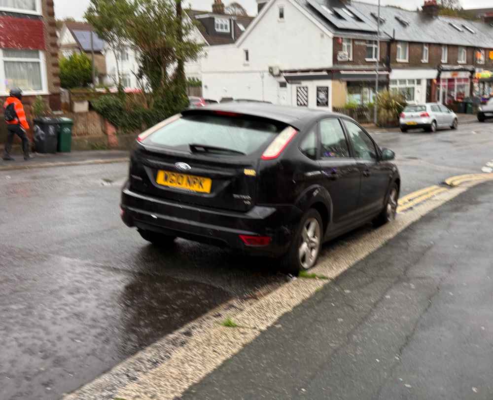 Photograph of WG10 NPK - a Black Ford Focus parked in Hollingdean by a non-resident. The eleventh of eleven photographs supplied by the residents of Hollingdean.