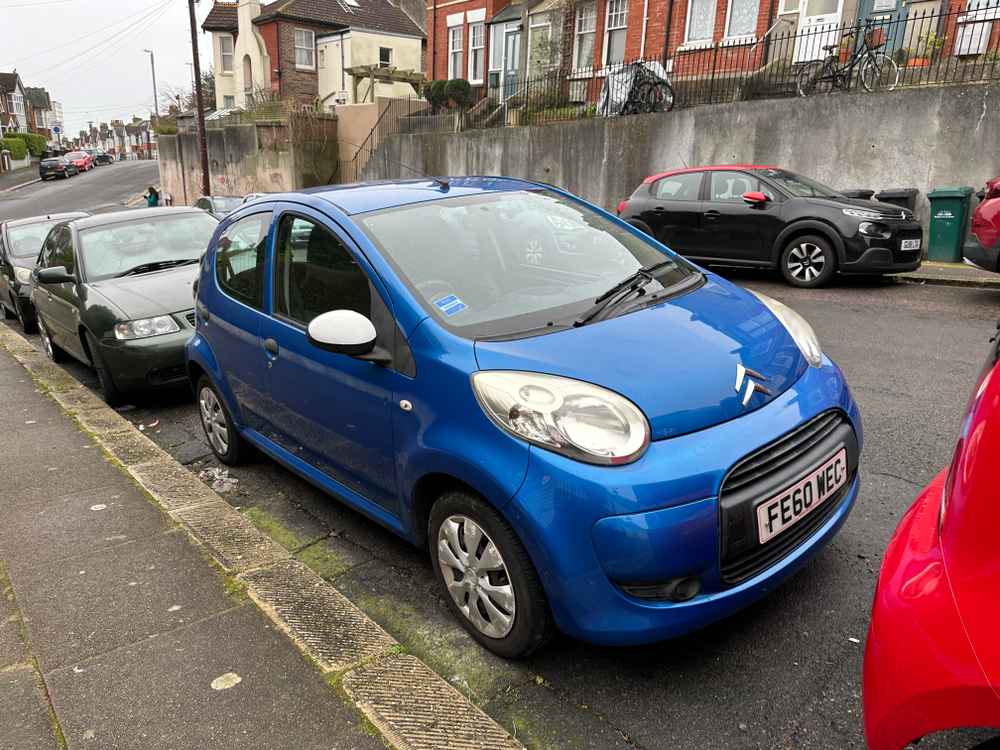 Photograph of FE60 WEC - a Blue Citroen C1 parked in Hollingdean by a non-resident. The tenth of thirteen photographs supplied by the residents of Hollingdean.