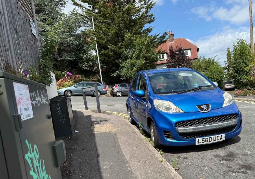 Photograph of LS60 UCA - a Blue Peugeot 107 parked in Hollingdean by a non-resident. The twenty-fifth of twenty-five photographs supplied by the residents of Hollingdean.