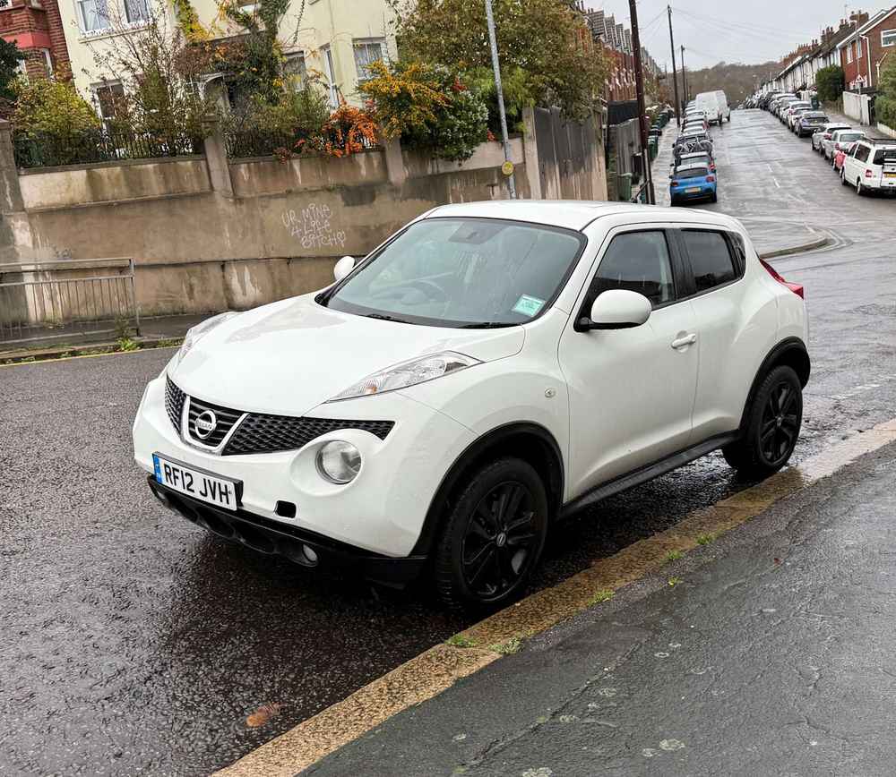 Photograph of RF12 JVH - a White Nissan Juke parked in Hollingdean by a non-resident who uses the local area as part of their Brighton commute. The twenty-first of twenty-five photographs supplied by the residents of Hollingdean.