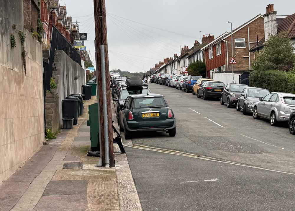 Photograph of GJ06 JUE - a Green Mini Cooper parked in Hollingdean by a non-resident. The sixteenth of seventeen photographs supplied by the residents of Hollingdean.