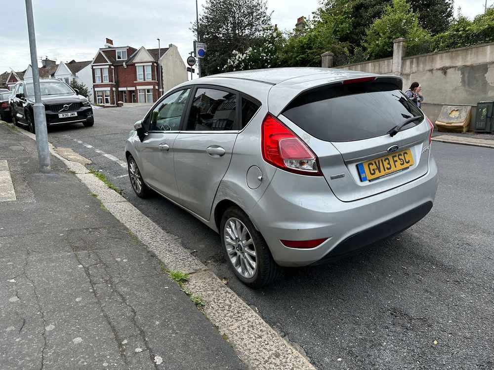 Photograph of GV13 FSC - a Silver Ford Fiesta parked in Hollingdean by a non-resident. 