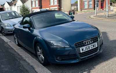 WJ58 CWU, a Blue Audi TT parked in Hollingdean