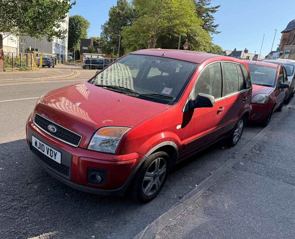 Photograph of WJ10 VDY - a Red Ford Fusion parked in Hollingdean by a non-resident. The fifth of five photographs supplied by the residents of Hollingdean.
