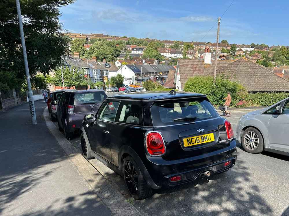 Photograph of NC16 BMU - a Black Mini Cooper parked in Hollingdean by a non-resident who uses the local area as part of their Brighton commute. The sixth of thirteen photographs supplied by the residents of Hollingdean.