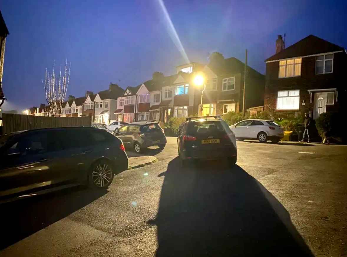 Photograph of HW11 GSU - a Blue Ford Focus parked in Hollingdean. The third of three photographs supplied by the residents of Hollingdean.