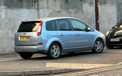 YX07 OBM, a Silver Ford Focus C-Max parked in Hollingdean
