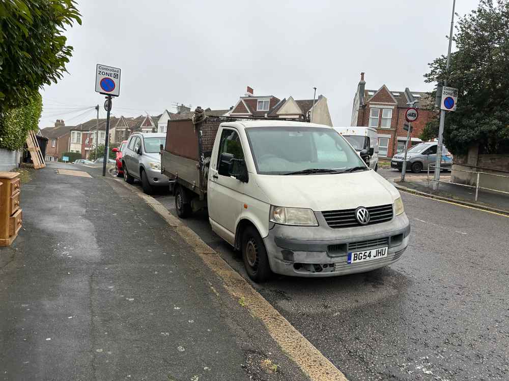 Photograph of BG54 JHU - a White Volkswagen T-Sporter parked in Hollingdean by a non-resident. The thirteenth of fifteen photographs supplied by the residents of Hollingdean.