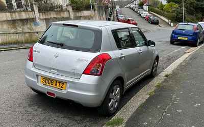 SD08 ATZ, a Silver Suzuki Swift parked in Hollingdean