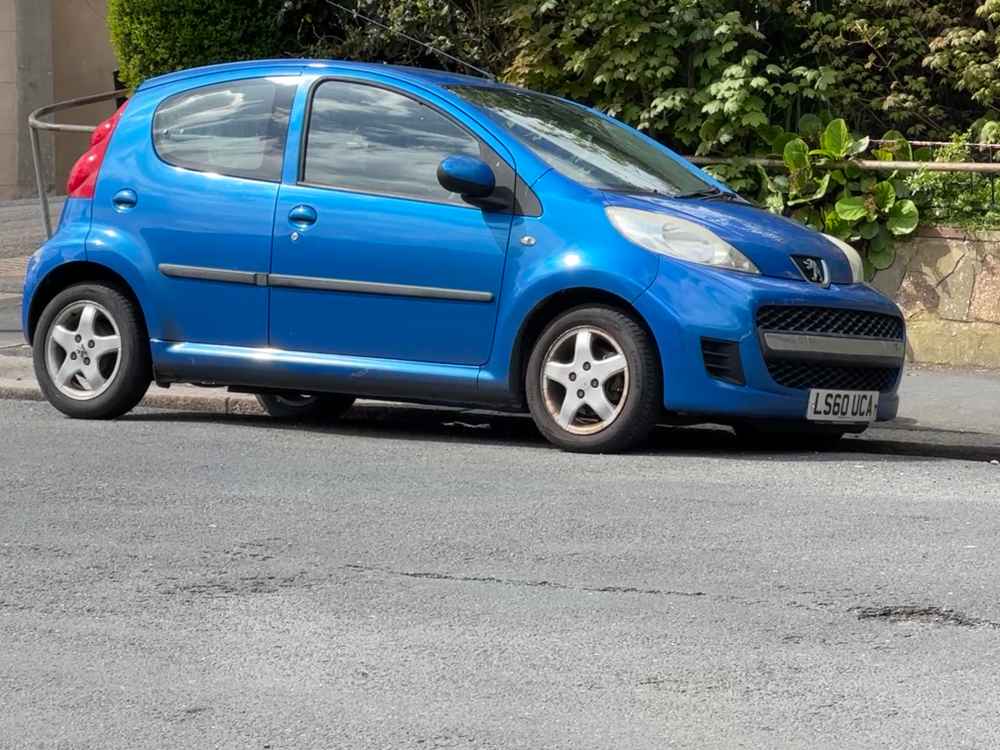 Photograph of LS60 UCA - a Blue Peugeot 107 parked in Hollingdean by a non-resident. The tenth of thirteen photographs supplied by the residents of Hollingdean.