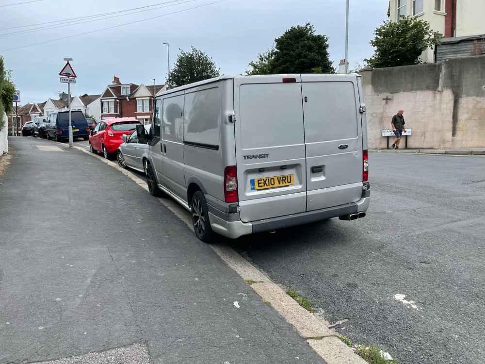 Photograph of EX10 VRU - a Silver Ford Transit parked in Hollingdean by a non-resident. The second of sixteen photographs supplied by the residents of Hollingdean.