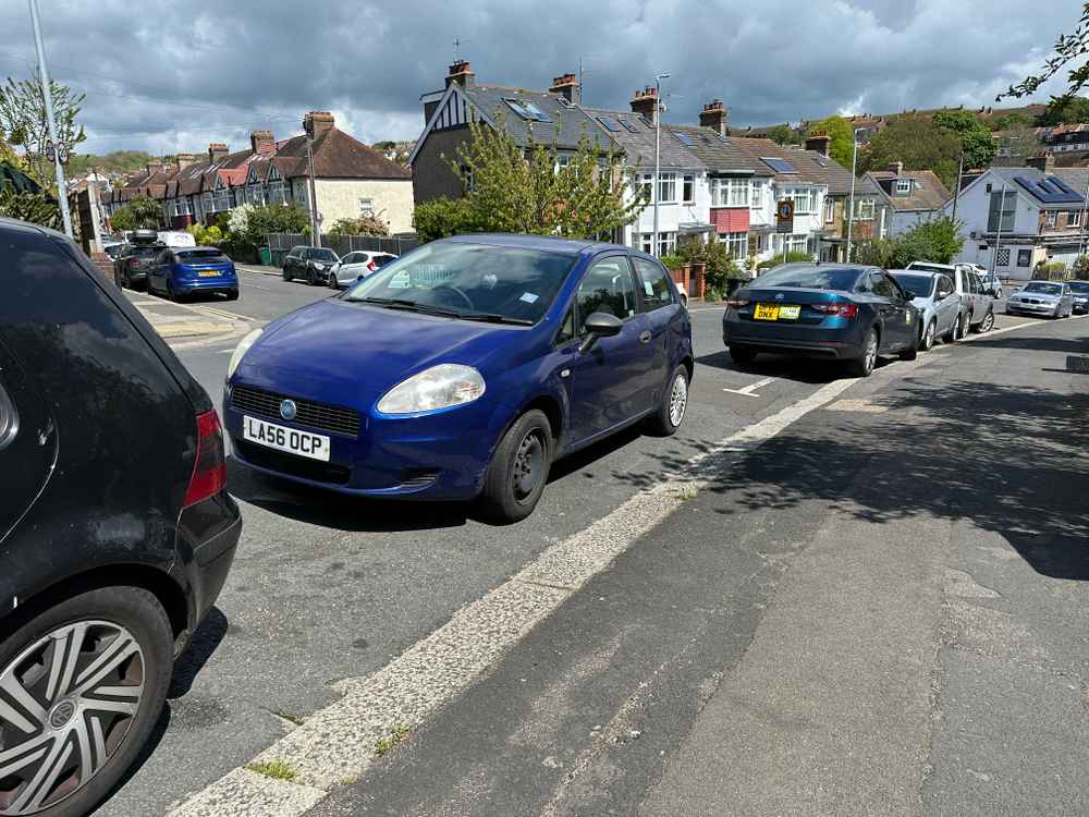 Photograph of LA56 OCP - a Blue Fiat Punto parked in Hollingdean by a non-resident, and potentially abandoned. The fifth of six photographs supplied by the residents of Hollingdean.