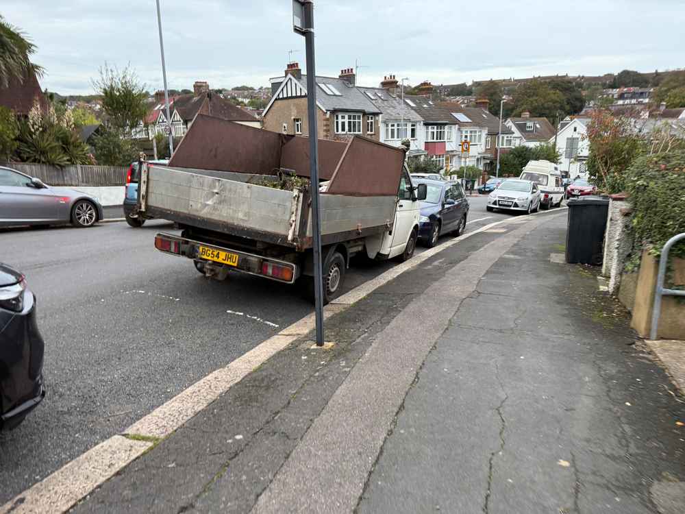 Photograph of BG54 JHU - a White Volkswagen T-Sporter parked in Hollingdean by a non-resident. The sixteenth of seventeen photographs supplied by the residents of Hollingdean.