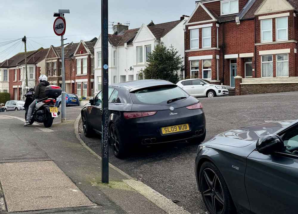 Photograph of SL09 WUB - a Black Alfa Romeo Brera parked in Hollingdean by a non-resident. The twenty-seventh of forty-four photographs supplied by the residents of Hollingdean.