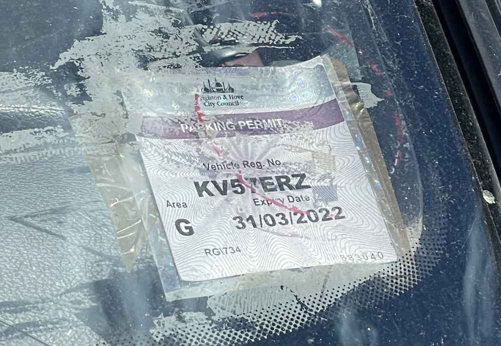 Photograph of KV57 ERZ - a Black Peugeot 206 parked in Hollingdean by a non-resident. The first of eight photographs supplied by the residents of Hollingdean.