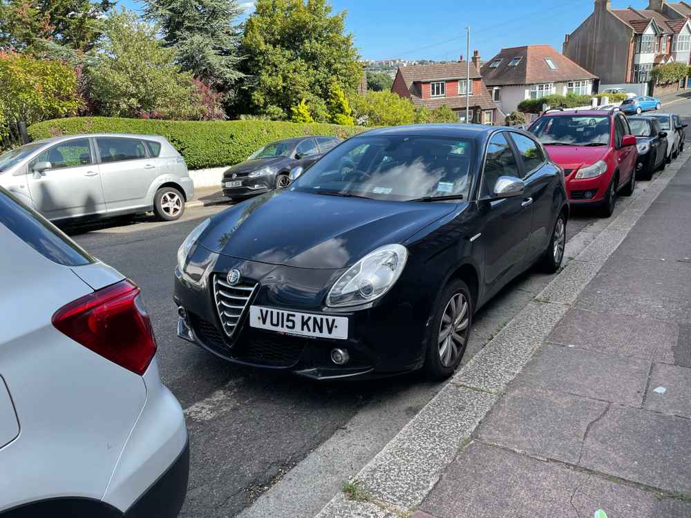 Photograph of VU15 KNV - a Black Alfa Romeo Giulietta parked in Hollingdean by a non-resident. The second of fifteen photographs supplied by the residents of Hollingdean.