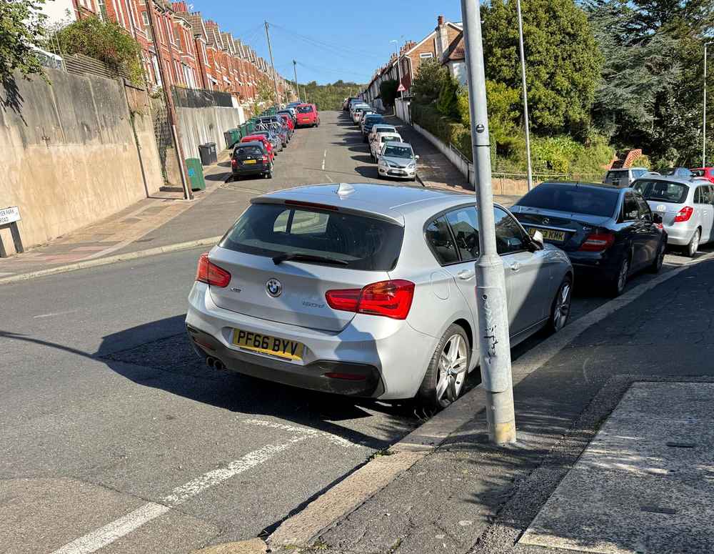 Photograph of PF66 BYV - a Silver BMW 1 Series parked in Hollingdean by a non-resident, and potentially abandoned. The first of three photographs supplied by the residents of Hollingdean.
