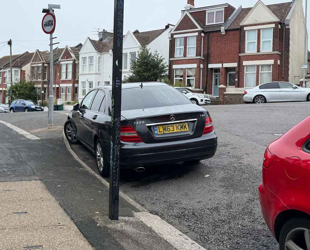 Photograph of LM63 KMK - a Black Mercedes C Class parked in Hollingdean by a non-resident who uses the local area as part of their Brighton commute. The sixth of eleven photographs supplied by the residents of Hollingdean.