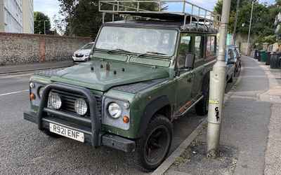 R921 ENF, a Green Land Rover Defender parked in Hollingdean