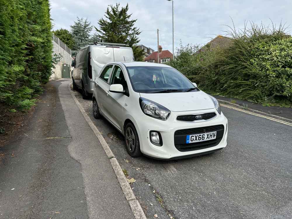 Photograph of GY66 XHV - a White Kia Picanto parked in Hollingdean by a non-resident. The fifth of five photographs supplied by the residents of Hollingdean.