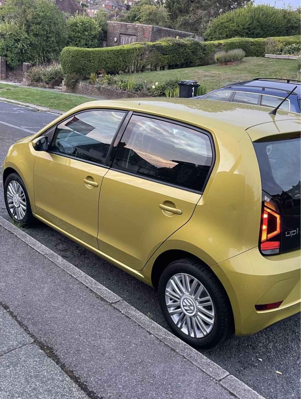 Photograph of VX66 XEG - a Gold Volkswagen Up parked in Hollingdean by a non-resident and stored here whilst a dodgy car dealer attempts to sell it. The fourth of four photographs supplied by the residents of Hollingdean.