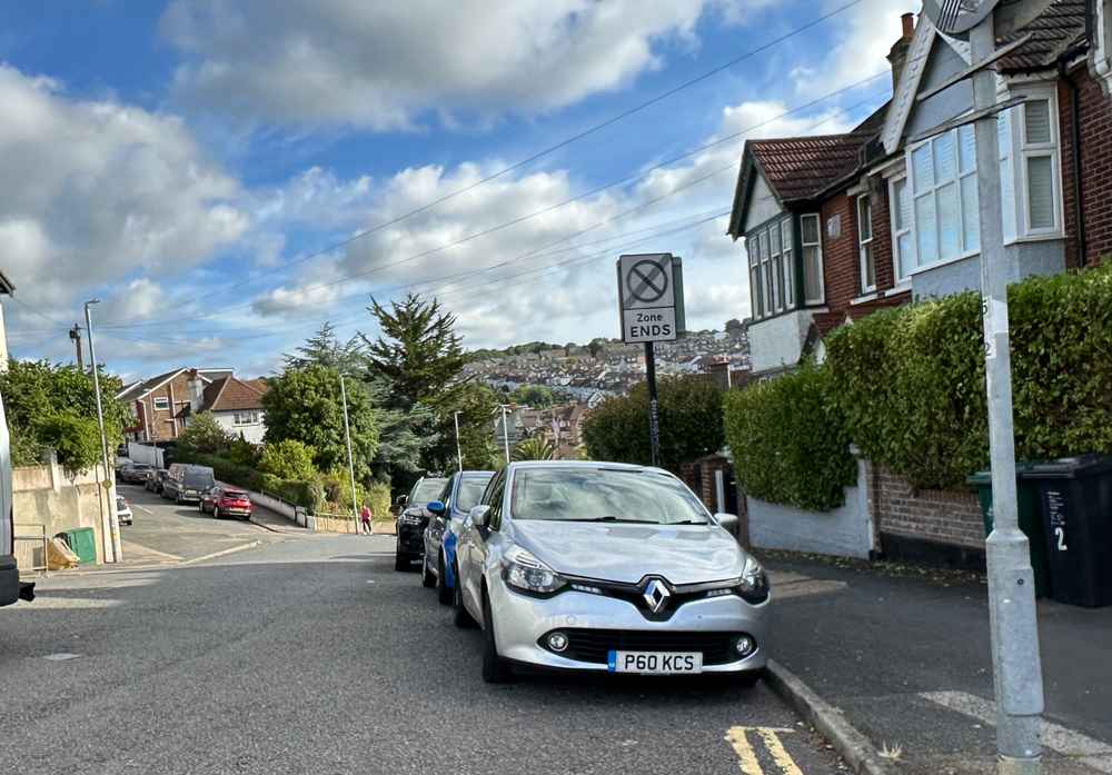 Photograph of P60 KCS - a Silver Renault Clio parked in Hollingdean by a non-resident. The first of two photographs supplied by the residents of Hollingdean.