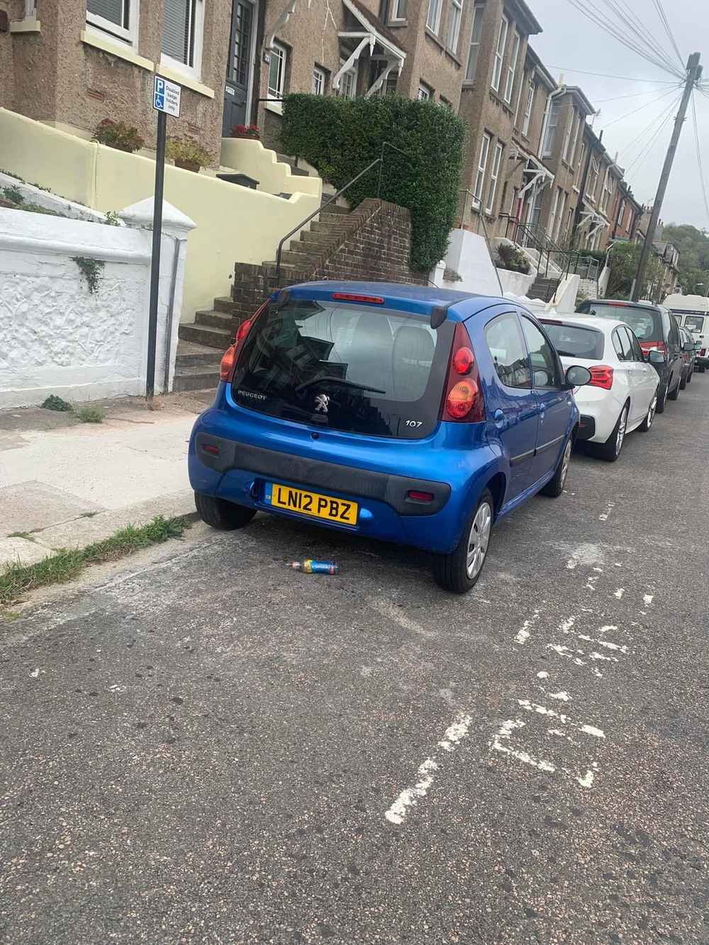 Photograph of LN12 PBZ - a Blue Peugeot 107 parked in Hollingdean by a non-resident. The fourth of six photographs supplied by the residents of Hollingdean.
