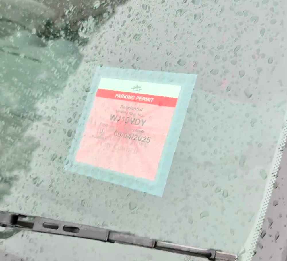 Photograph of WJ10 VDY - a Red Ford Fusion parked in Hollingdean by a non-resident. The first of two photographs supplied by the residents of Hollingdean.