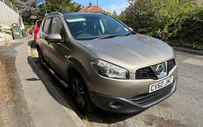 CV60 JWC, a Gold Nissan  Qashqai parked in Hollingdean