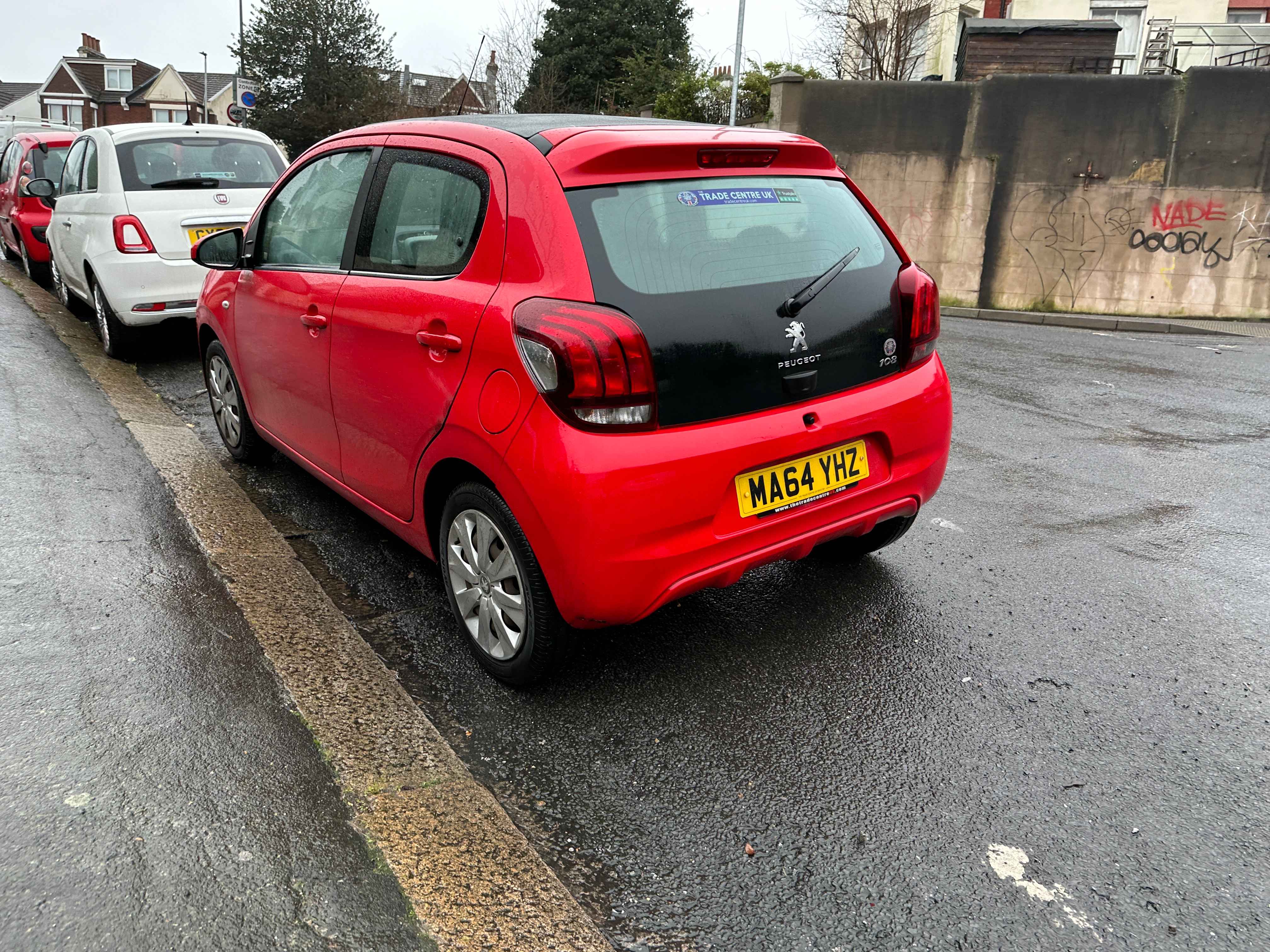 Photograph of MA64 YHZ - a Red Peugeot 108 parked in Hollingdean by a non-resident who uses the local area as part of their Brighton commute. The fourth of four photographs supplied by the residents of Hollingdean.